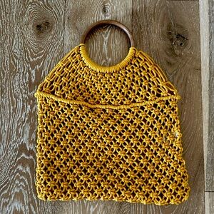 New! CROSSI NEW YORK Mustard yellow boho crochet handbag with wooden handles.